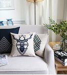 poduszki dekoracyjne skandynawski styl jeleń turkusowe geometryczne