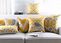 Żółte poduszki ozdobne na kanapę, świetne wzory Etno, Ikat, poduszki żółto-szare idealne na kanapę do salonu.