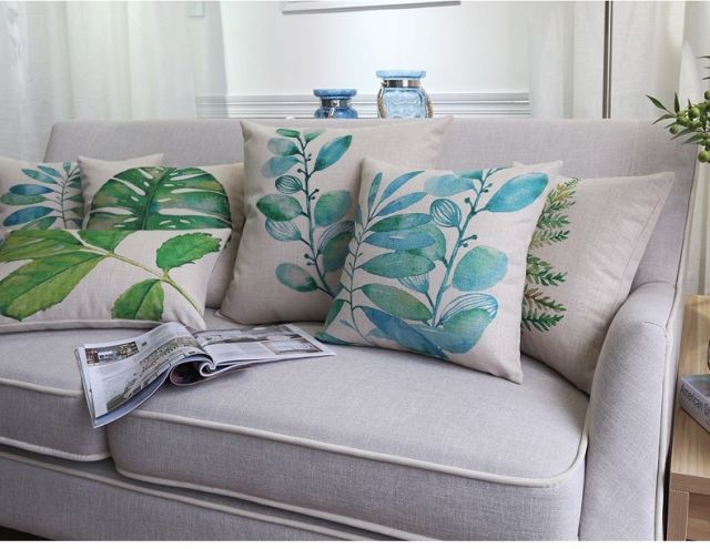 Zielone poduszki dekoracyjne w liście na kanapę do salonu
